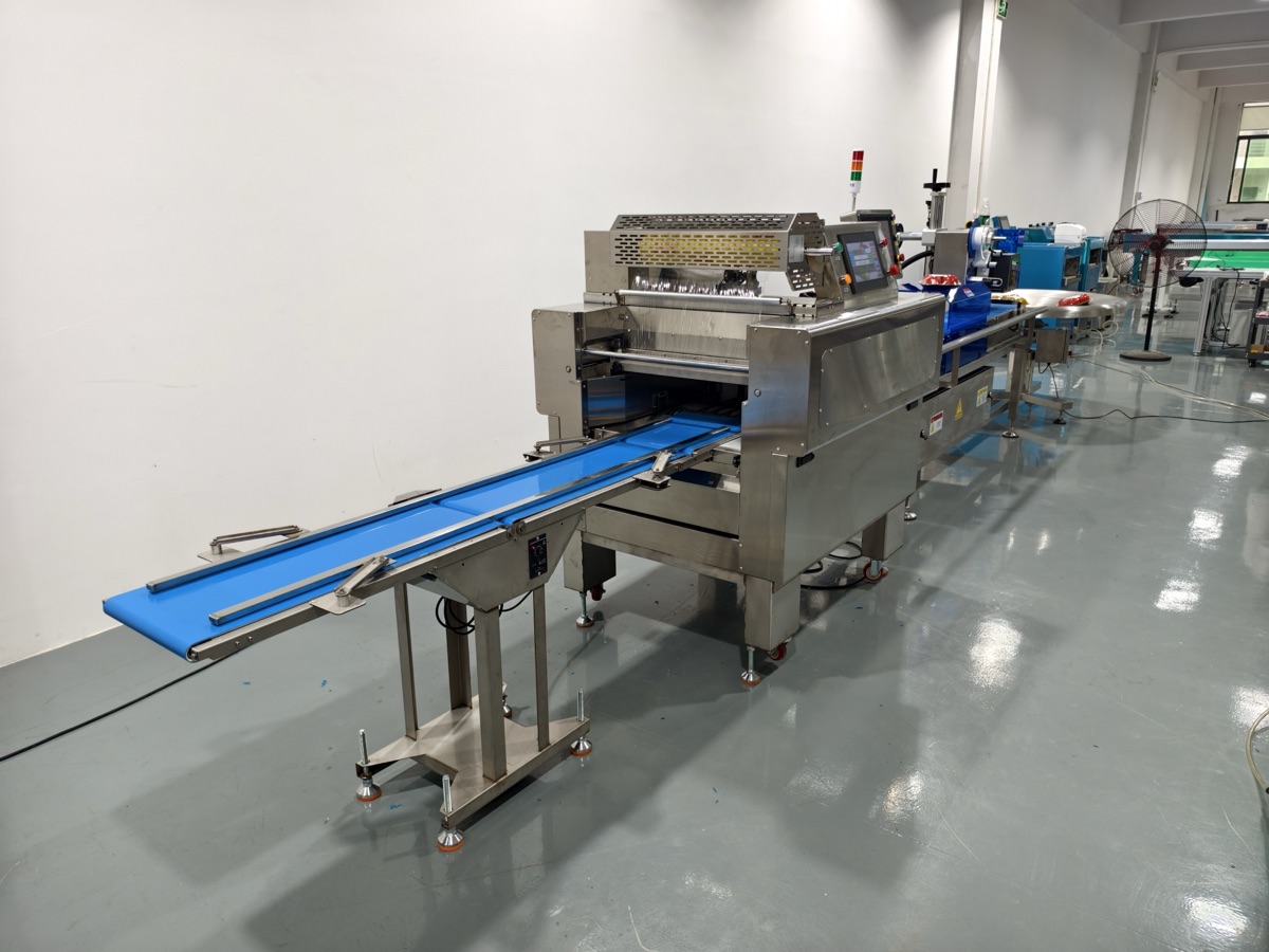 Vegetable tray wrapping line prepared for shipment to Canada