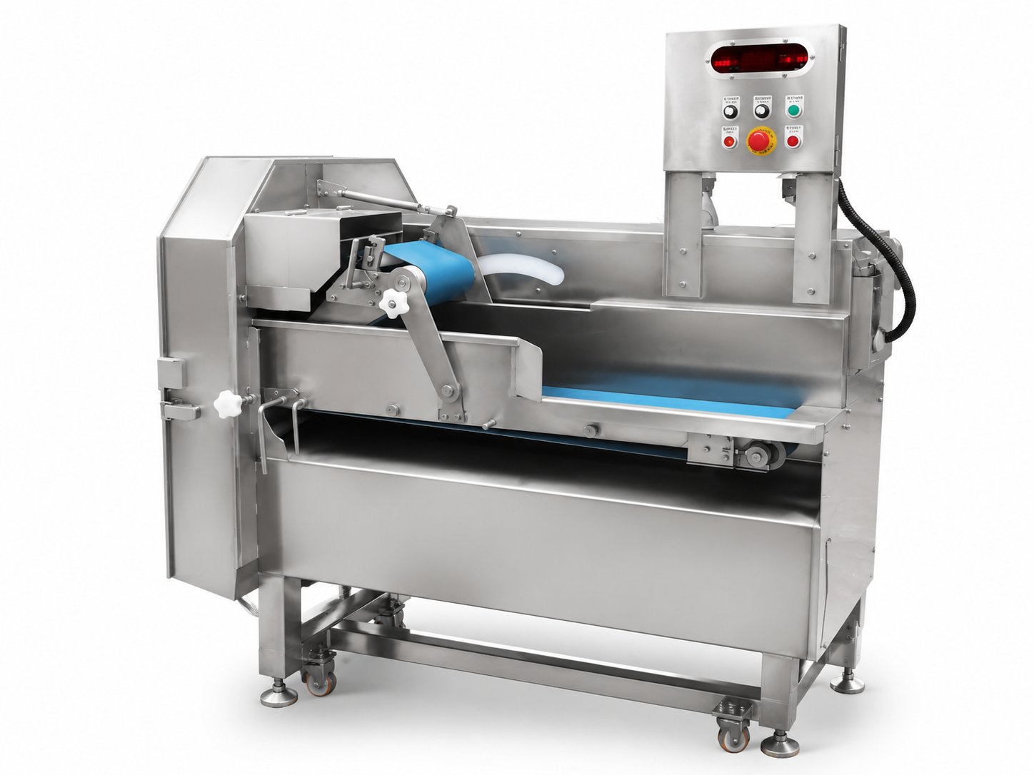 Vegetable cutting machine shredding whole leafy heads into salad fragments